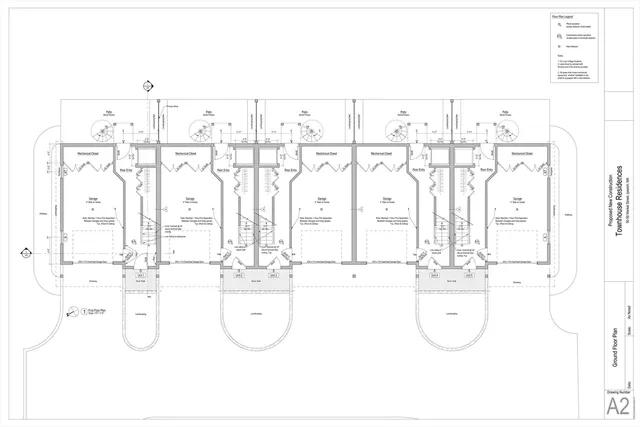 a bathroom with a bathtub a mirror and a sink