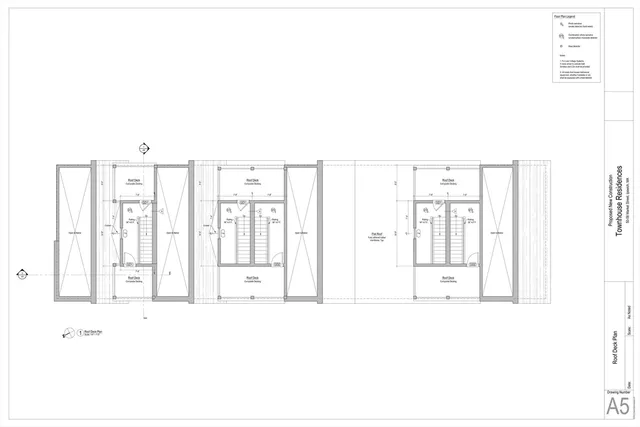 a black and white photo of a living room