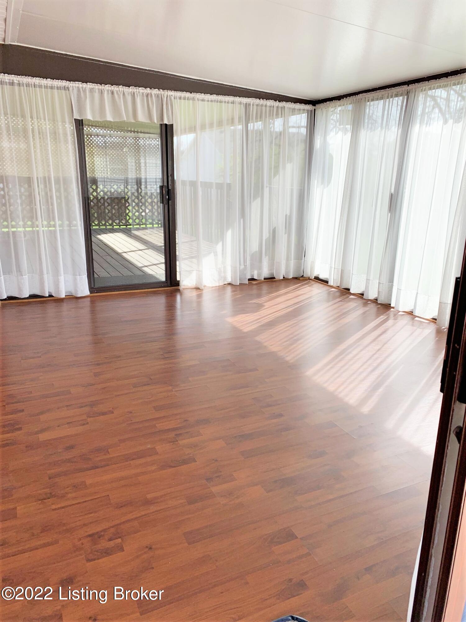 7002 Ledgerock Road Louisville, KY 40219 - Photo 22 of 28 Covered sunroom.