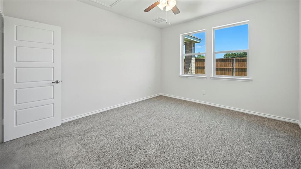 3516 Ample Vista Road Aubrey, TX 76227 - Photo 10 of 36 an empty room with a window