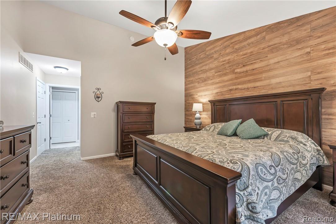 1013 Yarrow Howell, MI 48843 - Photo 14 of 35 En Suite Master Bedroom with Rustic Modern Accent Wall