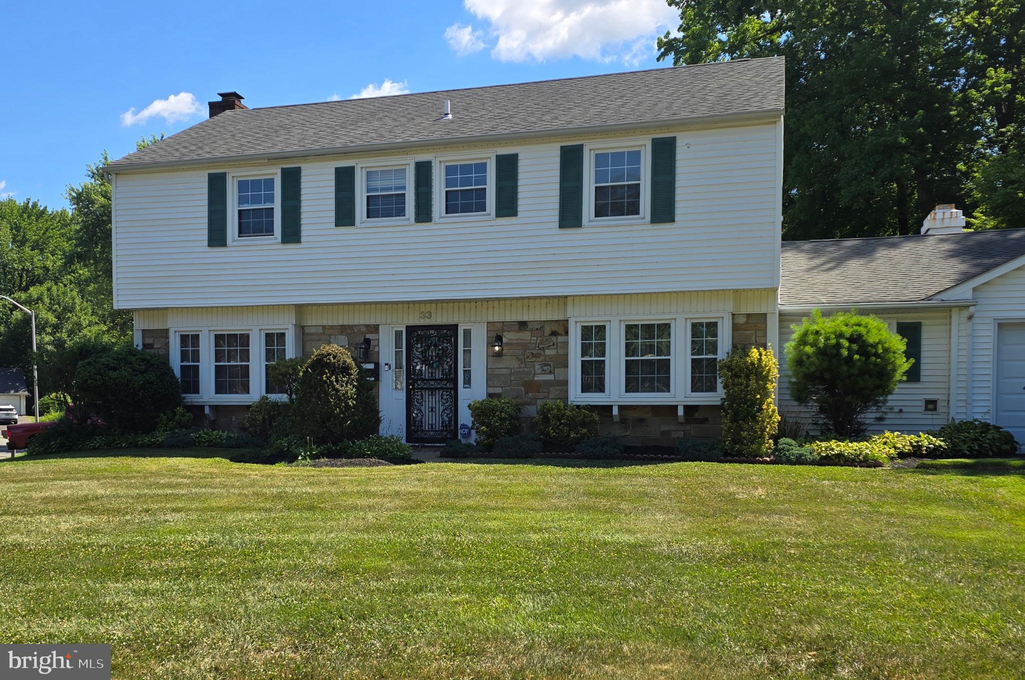 33 Timber Lane Willingboro, NJ 08046 - Photo 2 of 31 a front view of a house with a yard
