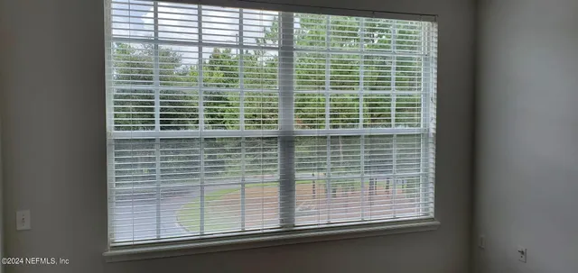 a bathroom with a toilet a sink and a shower