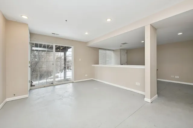 an empty room with windows