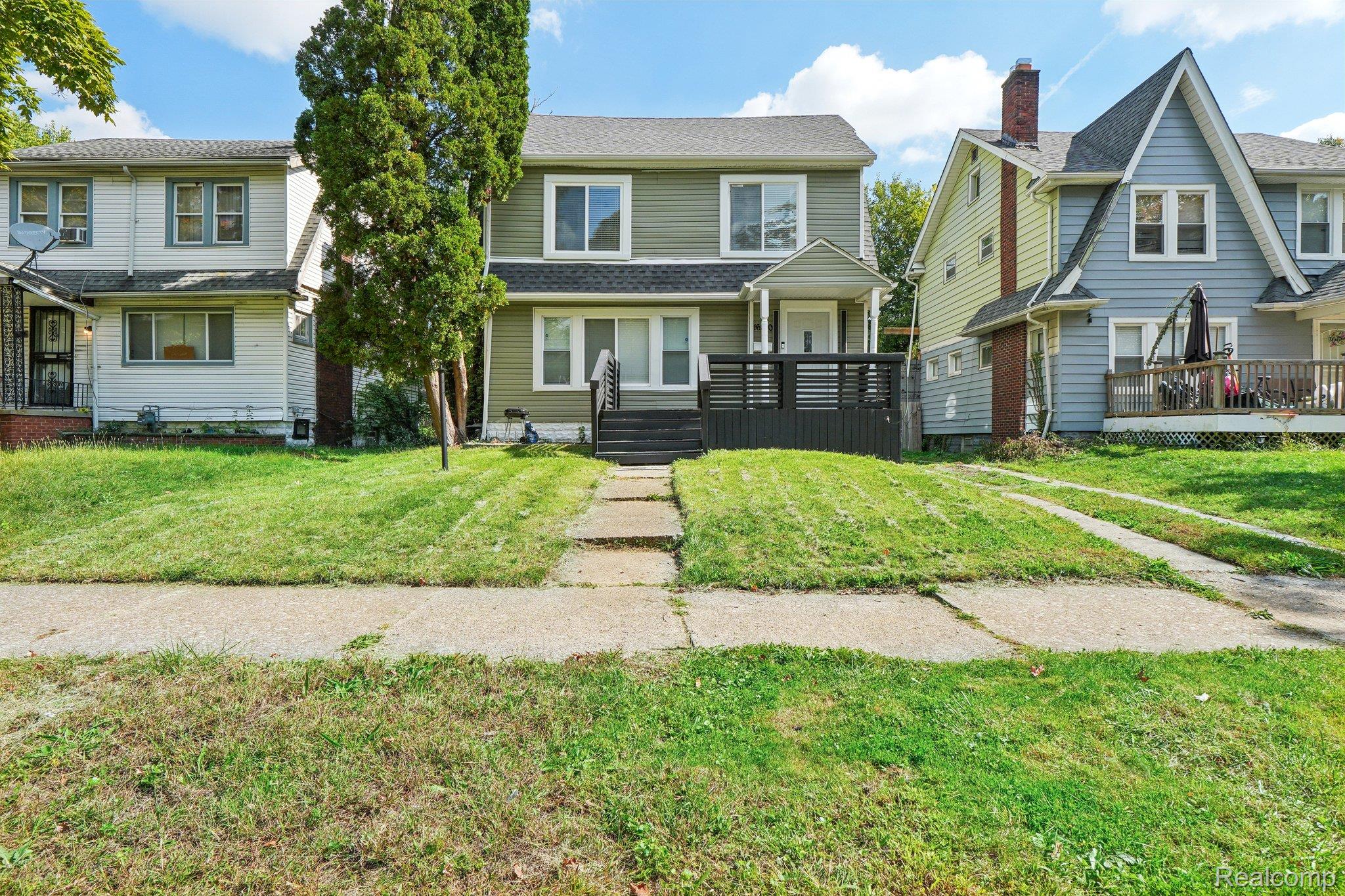 16210 Inverness Street Detroit, MI 48221 - Photo 1 of 29 Two-story dwelling with light green siding and white trim