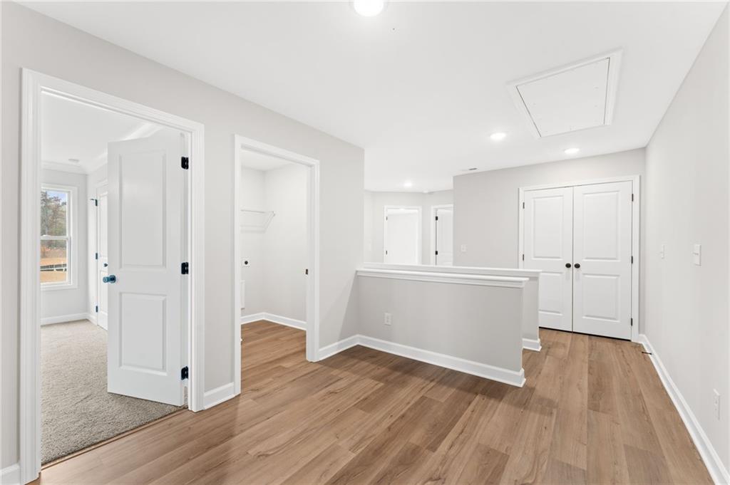 328 Colsen Drive Acworth, GA 30102 - Photo 16 of 23 a view of a room with wooden floor