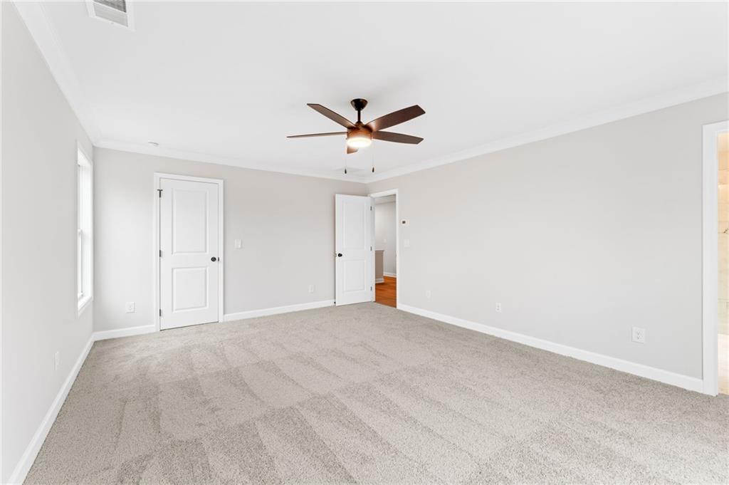 328 Colsen Drive Acworth, GA 30102 - Photo 17 of 23 a view of a livingroom with a ceiling fan