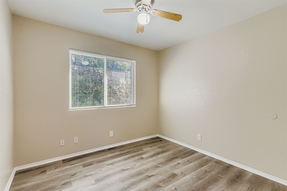 9201 Sedgemoor Trail, Unit A Austin, TX 78748 - Photo 11 of 11 a view of empty room with wooden floor