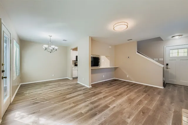 a view of an empty room and window