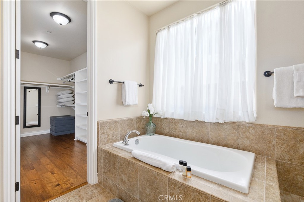 669 Red Cloud Road Paso Robles, CA 93446 - Photo 26 of 61 a bathroom with a tub and a shower