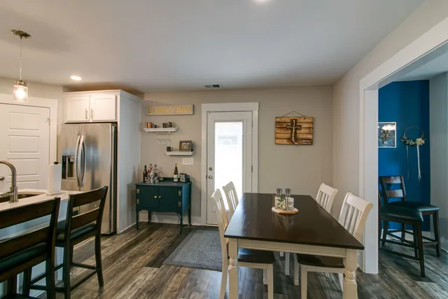 a view of a dining room with furniture