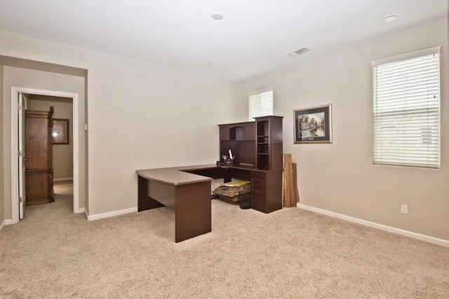 a room with furniture and window