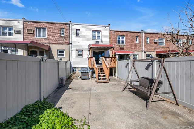 a view of a chairs and tables in patio
