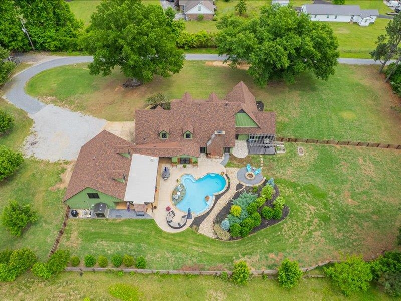 8104 Jack Bond Road Arlington, TN 38002 - Photo 38 of 40 an aerial view of residential houses with outdoor space and lake view