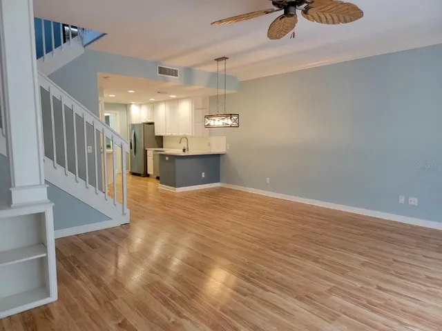 a view of a livingroom with wooden floor
