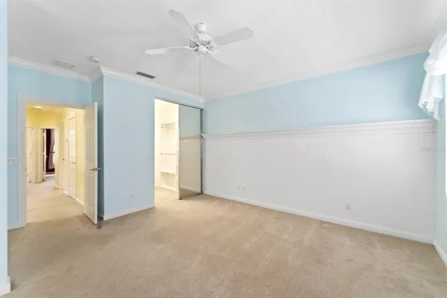 a view of an empty room with a bathroom