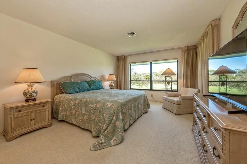 10153 Quail Covey Road, Unit HIBISCUS N Boynton Beach, FL 33436 - Photo 13 of 20 12_10153QuailCoveyRoad_14_PrimaryBedroom