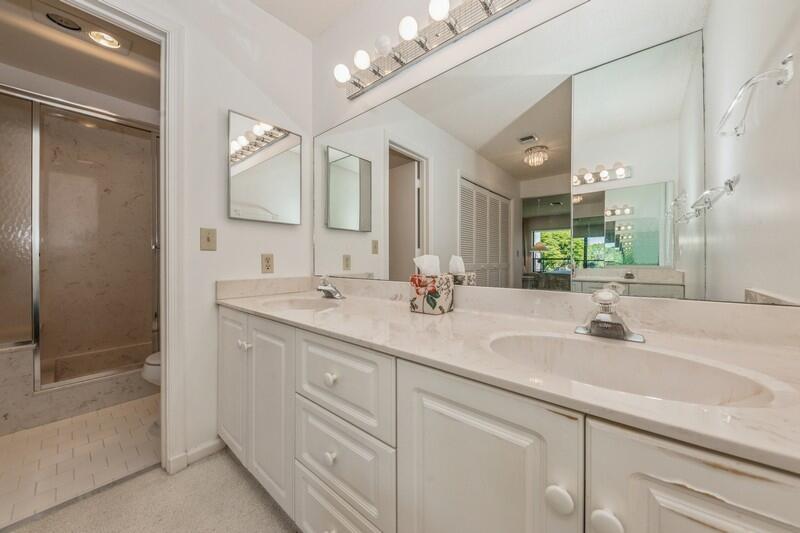 10153 Quail Covey Road, Unit HIBISCUS N Boynton Beach, FL 33436 - Photo 14 of 20 13_10153QuailCoveyRoad_13_PrimaryBathroo