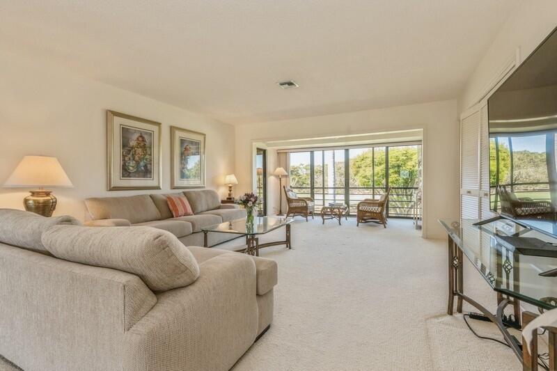 10153 Quail Covey Road, Unit HIBISCUS N Boynton Beach, FL 33436 - Photo 4 of 20 04_10153QuailCoveyRoad_1_LivingRoom_Flex