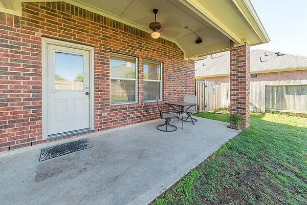 a front view of a house with patio