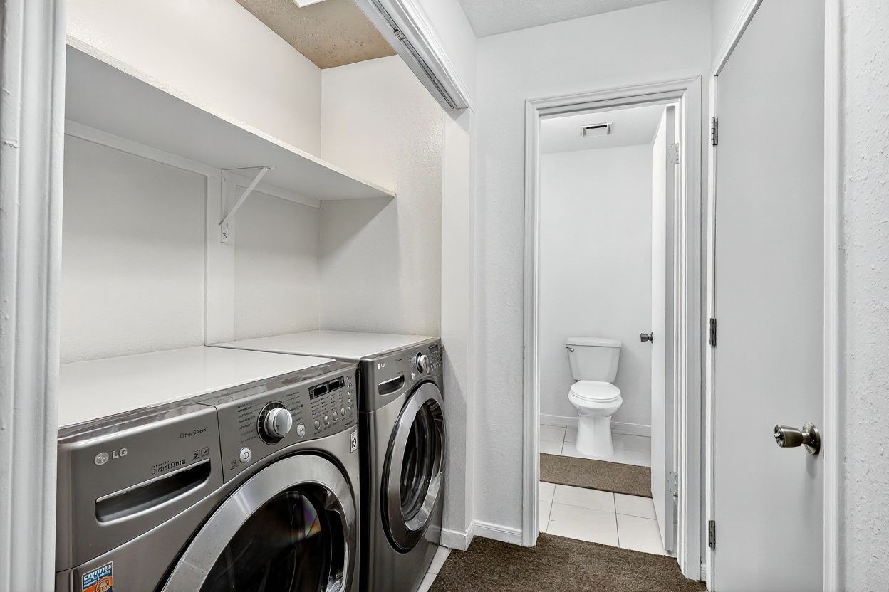 3402 Crystal Dove Drive Spring, TX 77388 - Photo 26 of 33 a utility room with dryer and washer