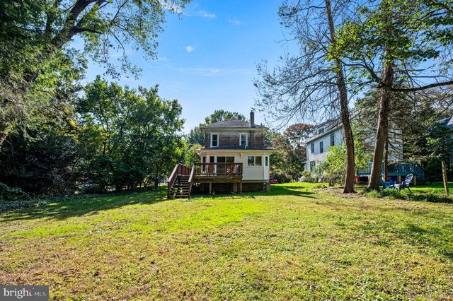 a view of a house with a big yard