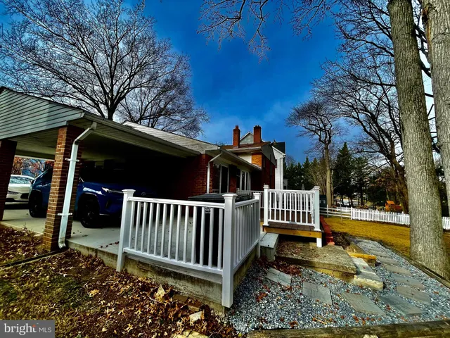 a view of a backyard with a deck