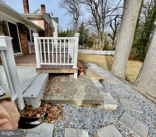 a balcony with wooden floor