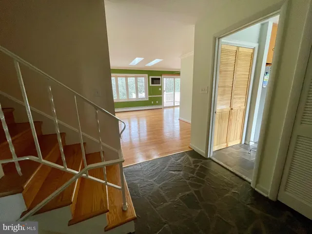 a view of an empty room with storage