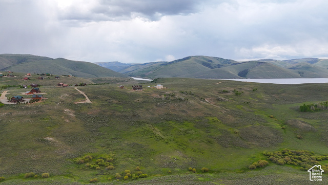 5236 North Holly Way Helper, UT 84526 - Photo 21 of 34 View of mountain backdrop with a nearby body of water and rural landscape