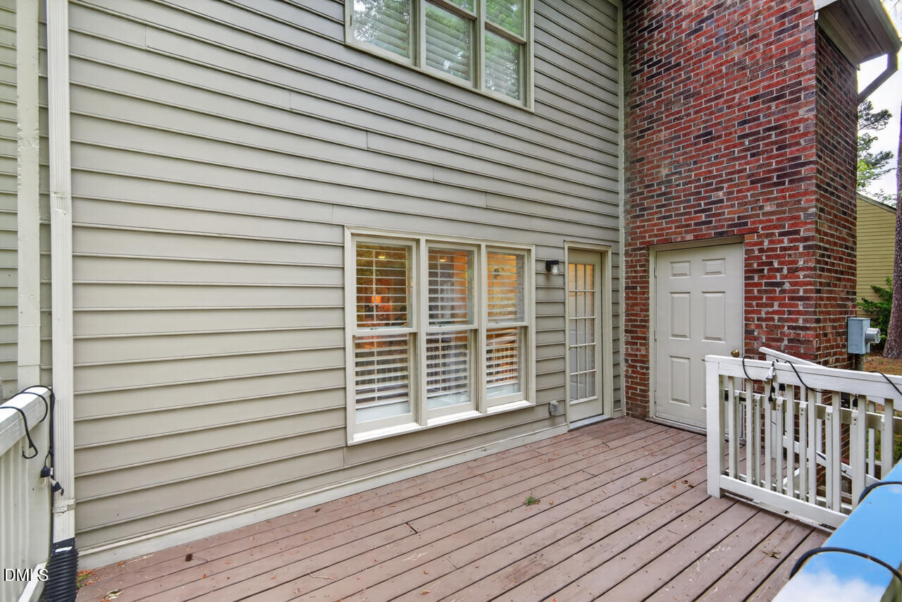 3307 Coachman's Way Durham, NC 27705 - Photo 46 of 50 a view of a house with wooden deck