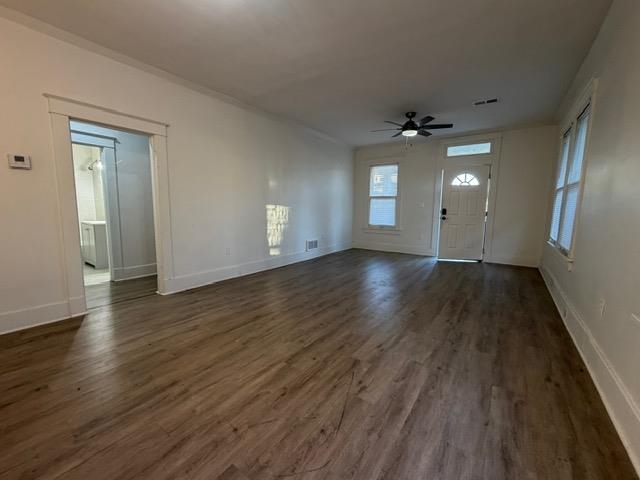 1073 Bruce Street Memphis, TN 38104 - Photo 2 of 12 a view of a room with wooden floor and window