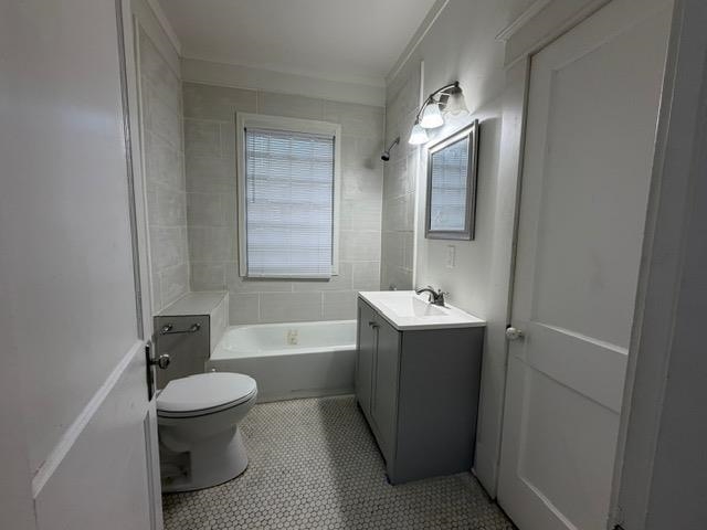 1073 Bruce Street Memphis, TN 38104 - Photo 10 of 12 a bathroom with a bathtub shower sink vanity and toilet