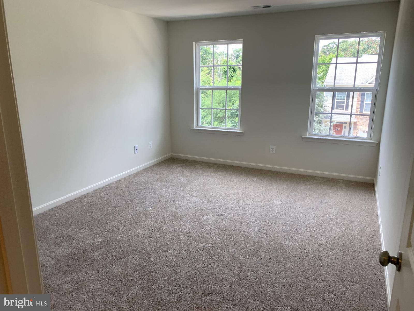 263 Trails Way Joppa, MD 21085 - Photo 15 of 27 an empty room with windows