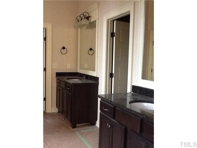 3207 Rain Forrest Way Raleigh, NC 27614 - Photo 17 of 25 Vaulted Master Bath with separate vanities with granite tops and dual closets. Master Bath/Spa