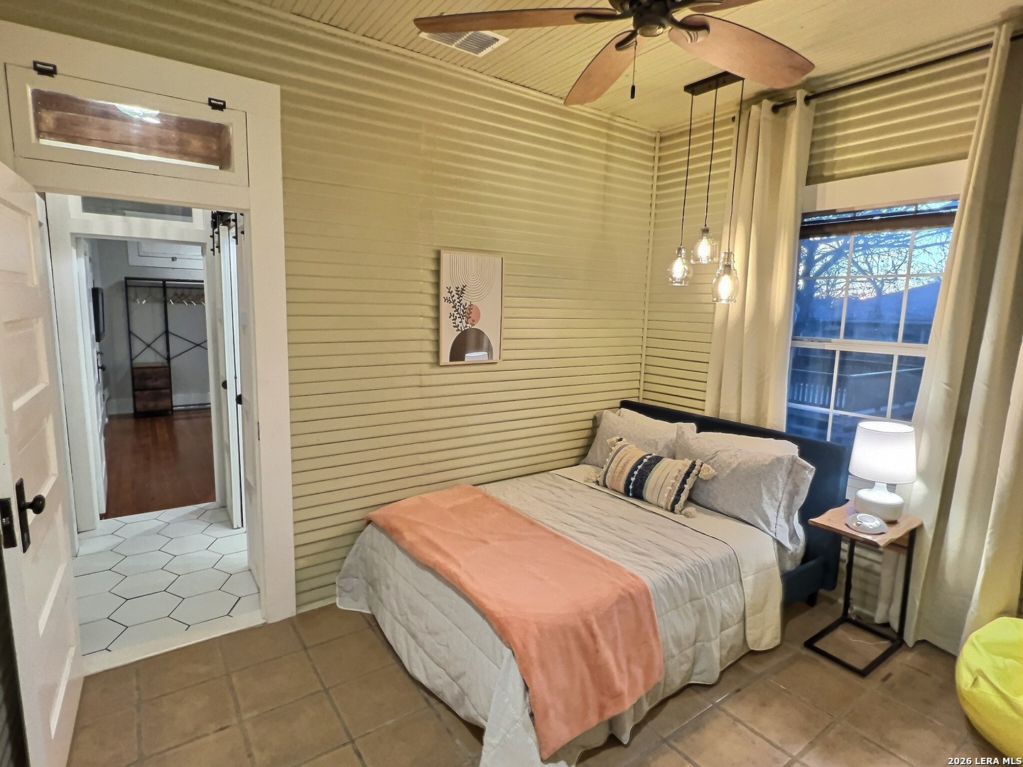 404 West Walnut Street Seguin, TX 78155 - Photo 21 of 32 a bedroom with a bed and a window