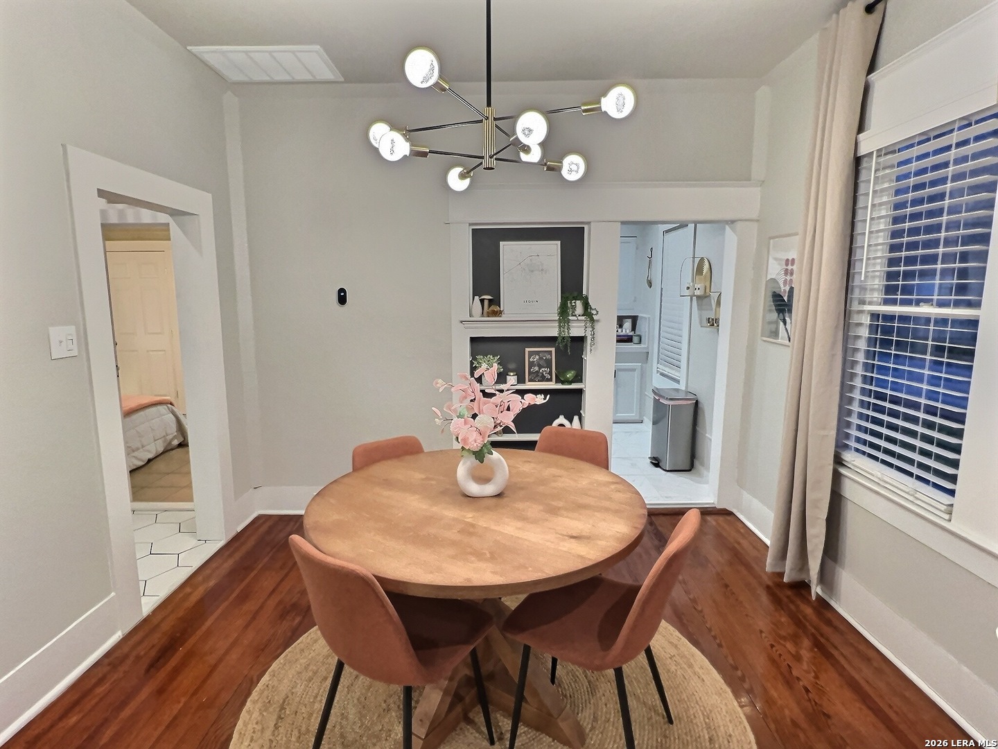 404 West Walnut Street Seguin, TX 78155 - Photo 8 of 32 a view of a dining room with furniture and wooden floor