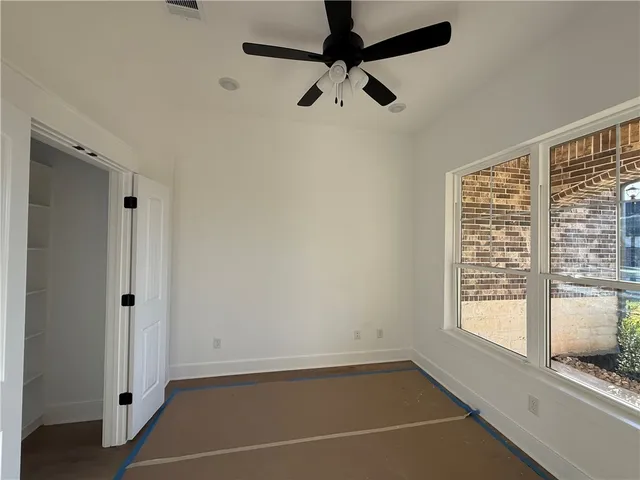 a bathroom with a sink a vanity and a mirror