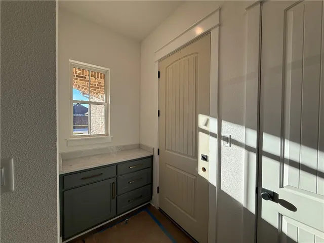 a room with storage and utility