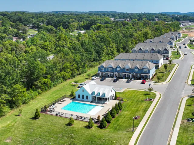 an aerial view of a house with a garden