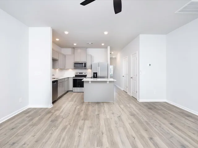 a large kitchen with cabinets