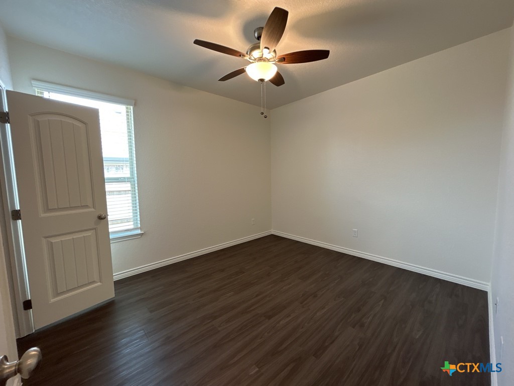 5110 Rose Gdn Loop Killeen, TX 76542 - Photo 14 of 19 wooden floor in an empty room with a window