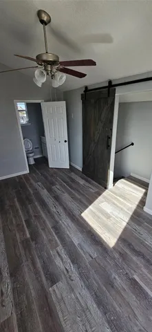 a bathroom with a toilet and a sink