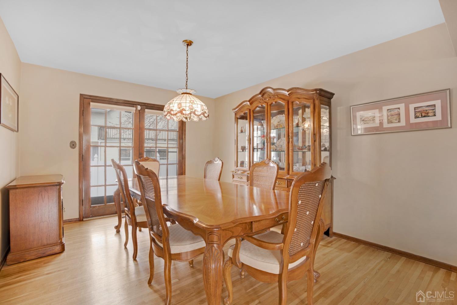 5 Diamond Drive Edison, NJ 08820 - Photo 11 of 35 a view of a dining room with furniture window and wooden floor