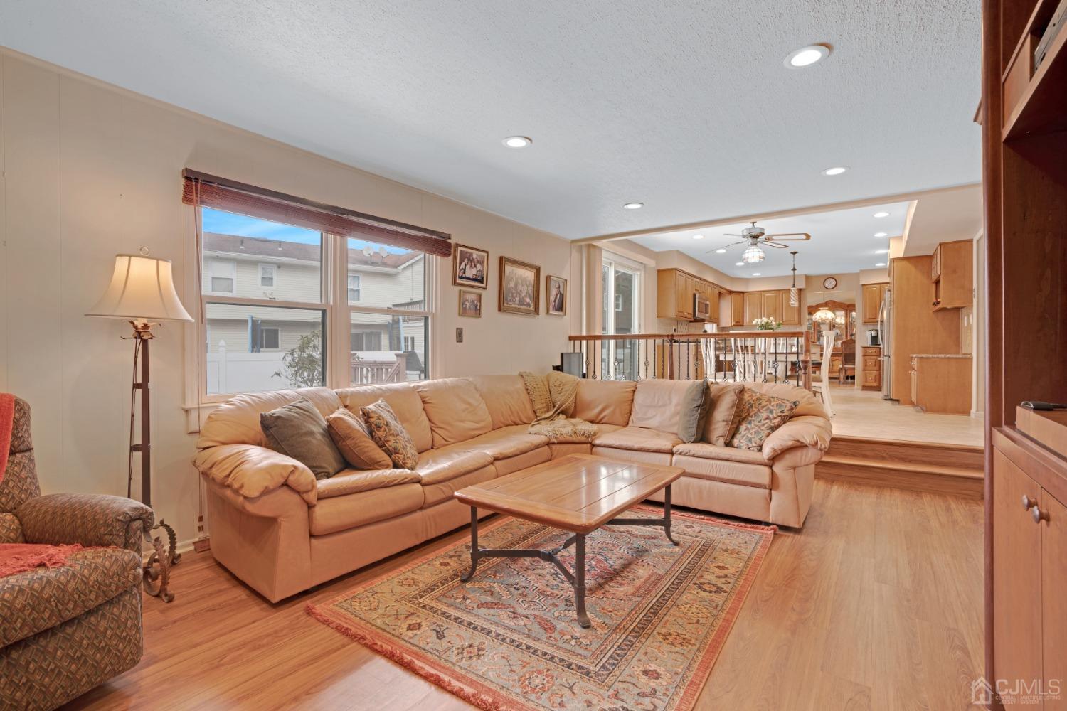5 Diamond Drive Edison, NJ 08820 - Photo 18 of 35 a living room with furniture and a large window