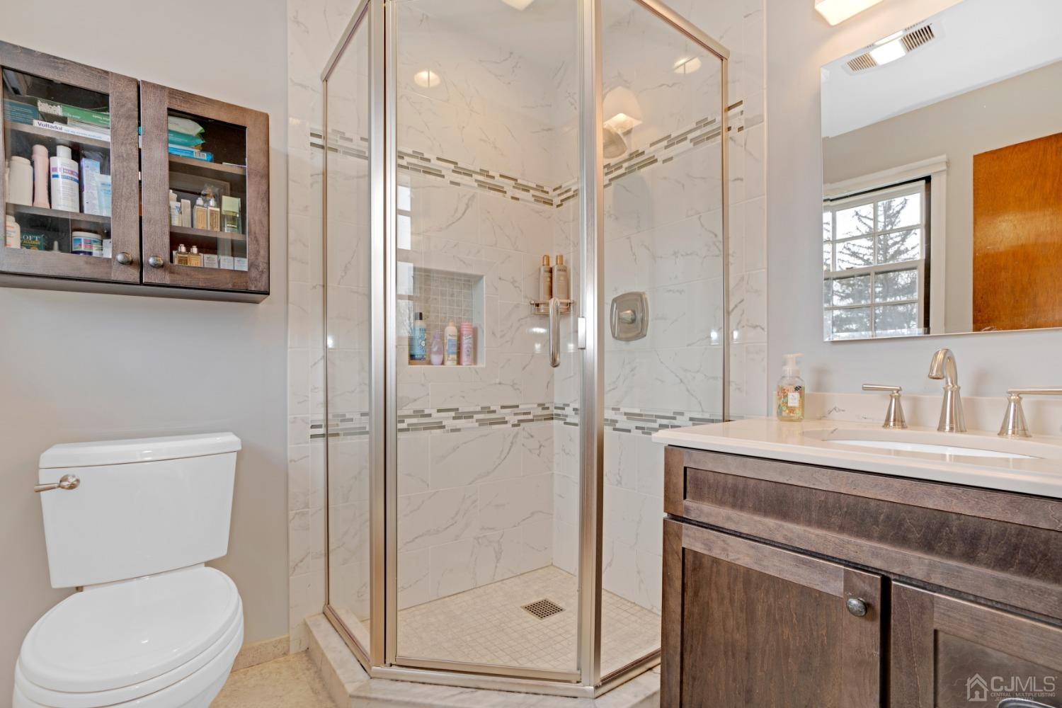 5 Diamond Drive Edison, NJ 08820 - Photo 23 of 35 a bathroom with a sink a toilet and shower