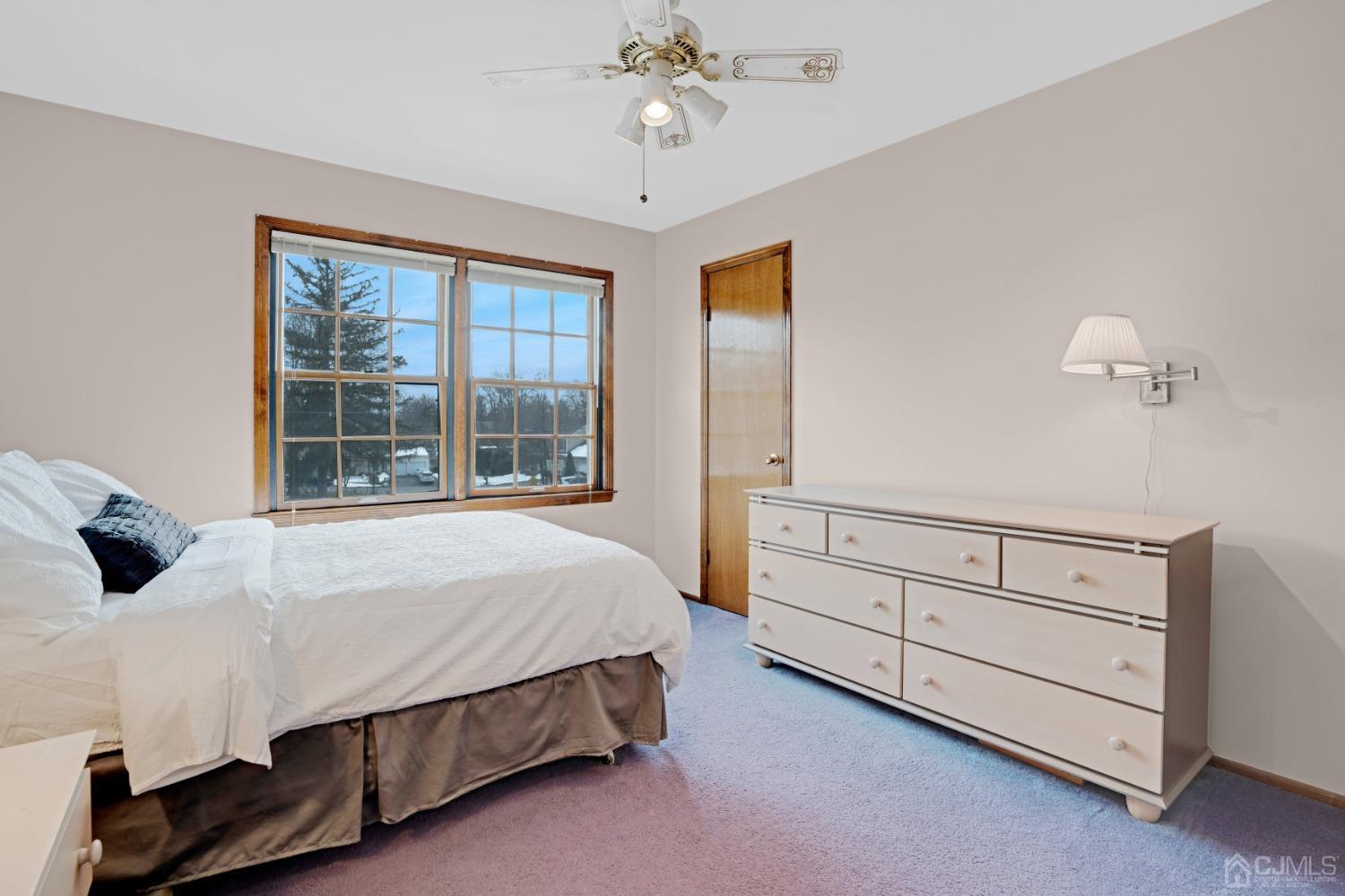 5 Diamond Drive Edison, NJ 08820 - Photo 27 of 35 a bedroom with a bed and a window