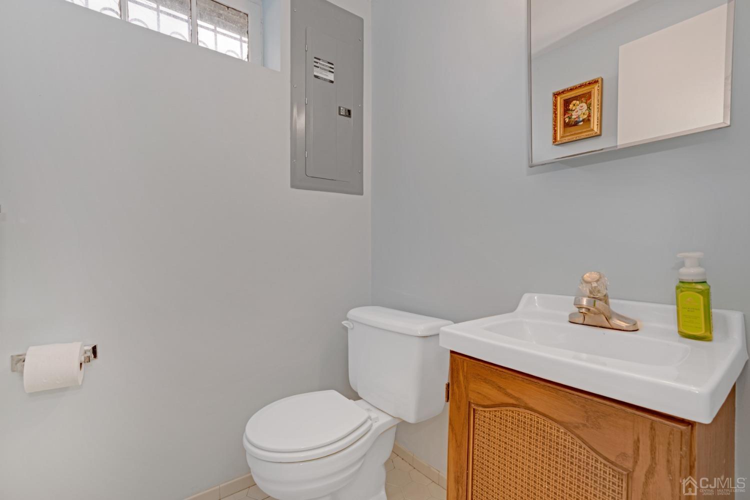 5 Diamond Drive Edison, NJ 08820 - Photo 30 of 35 a white toilet sitting next to a bathroom sink