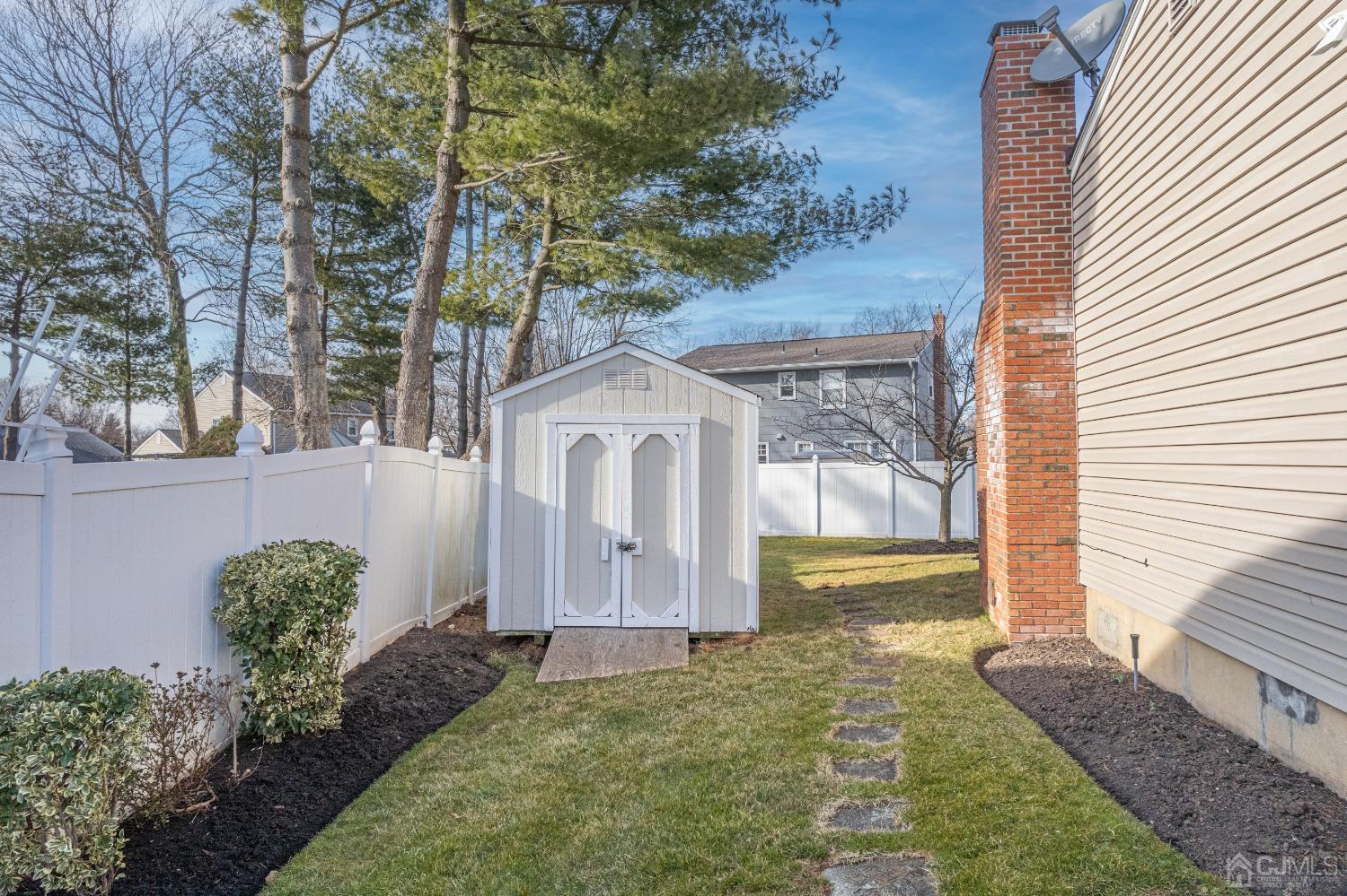 5 Diamond Drive Edison, NJ 08820 - Photo 34 of 35 a front view of a house with garden