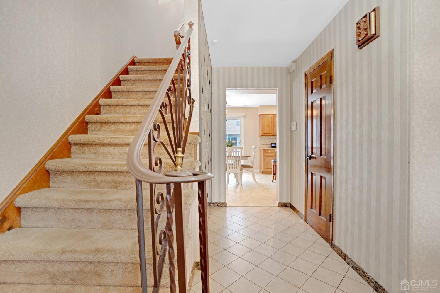 5 Diamond Drive Edison, NJ 08820 - Photo 7 of 35 a view of entryway and hall with wooden floor